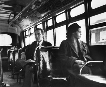 After the Supreme Court decision, Rosa Parks rides at the front of the bus.